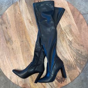 Black over the knee heel boots